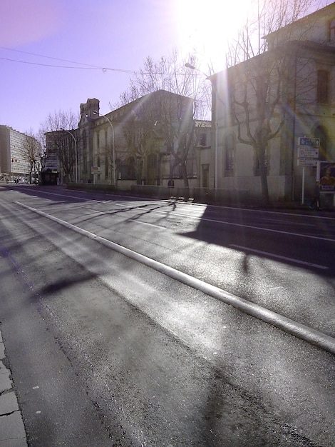 Road in city against sky