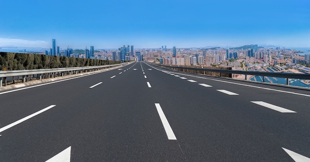 Road and city buildings background