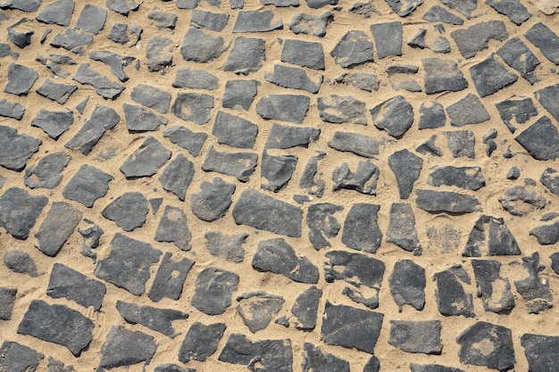 A road covered with granite tiles as a background