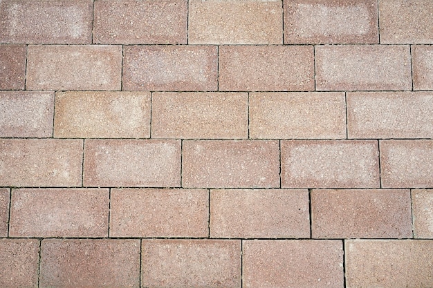 Photo road covered with red tiles