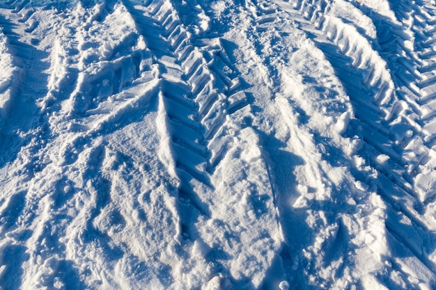 A road covered with snow in the winter season