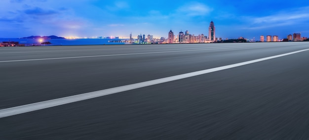 Road ground and modern architectural landscape skyline of Chinese city