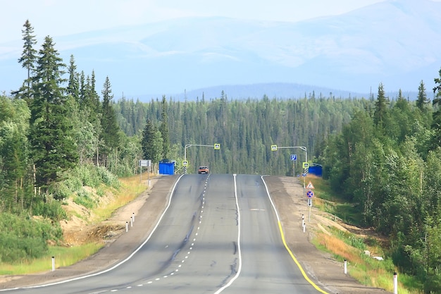 road highway autumn forest