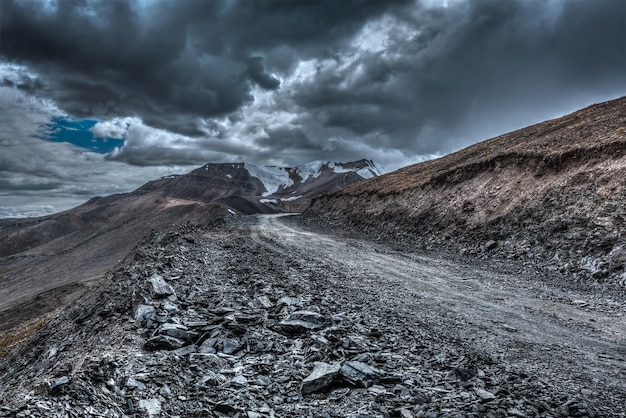 Road in Himalayas with mountains