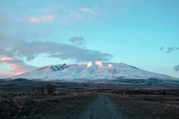 Road leading to snow mountain Arai