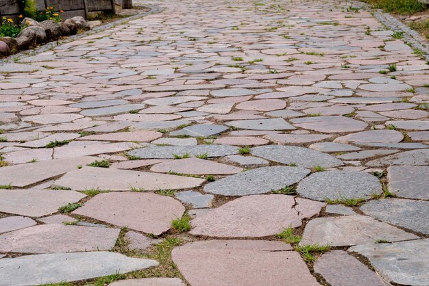 Foto una strada fatta di pietra.