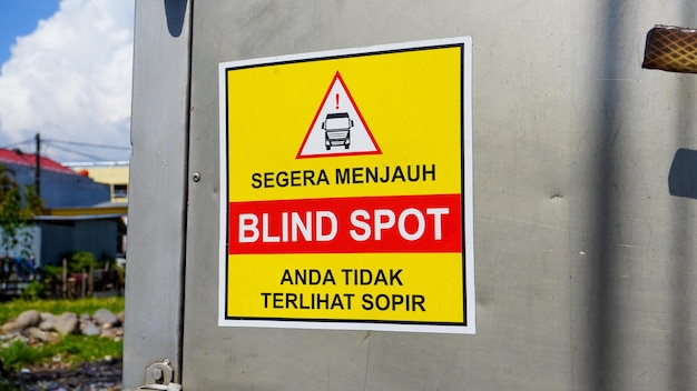 Road safety and traffic sign. Blind spot, Take care. Delivery truck icon. Back view of a lorry