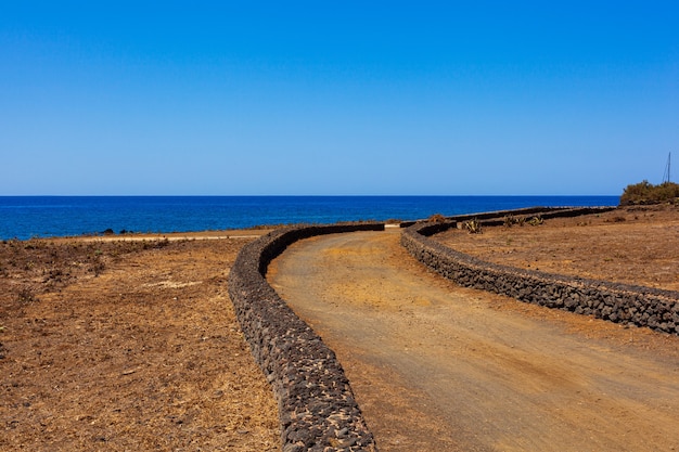 Road next to the sea in the Linosa island, Sicily