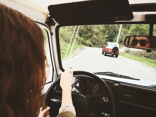 Road seen through car windshield