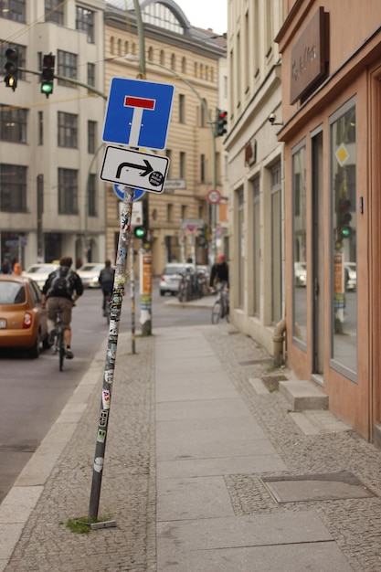 Road sign on street in city