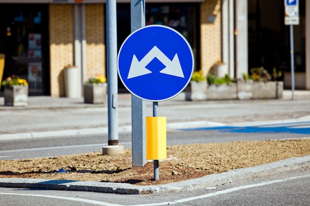 Road sign with two way left and on the right