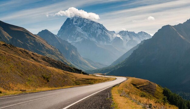 Road stretches through scenic mountains Beauty of nature Natural landscape Cloudy sky