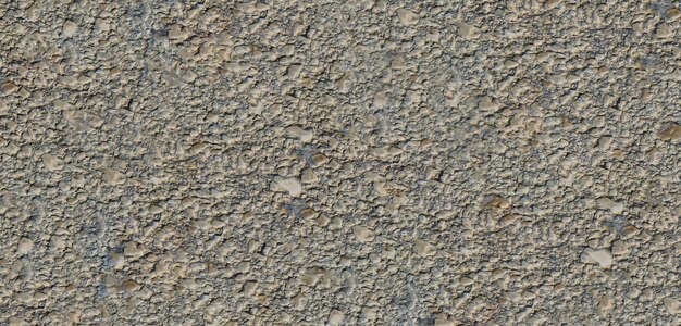 Road surface Fine cobblestone background Rough cement wall Asphalt gravel surface Stone gravel