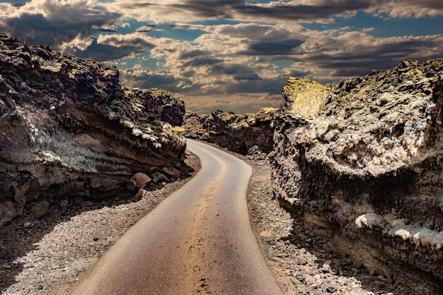 Road through the scenic landscape in Timanfaya natural park in Lanzarote,Canary island.