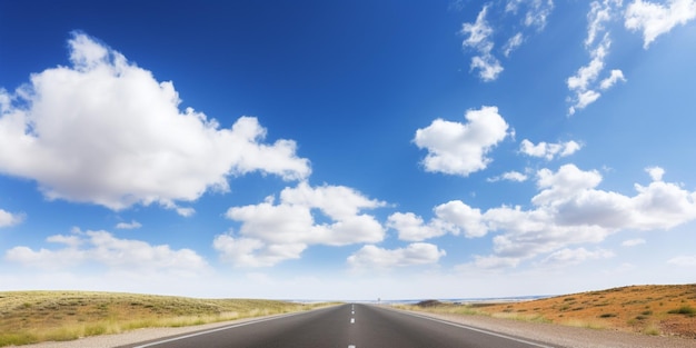 A road with a blue sky and clouds