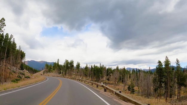 A road with a mountain in the background