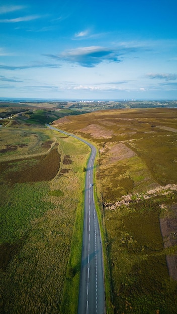 A road with a road that has a car on it