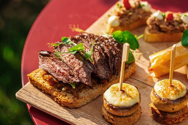 Roast beef and mushroom bruschettas on banquet