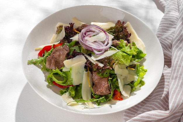 Roast beef salad on the serving plate