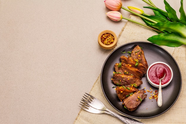 Roast and braised duck breast with sweet and sour berry sauce