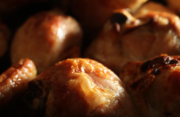 Roast chicken drumsticks on a baking pan