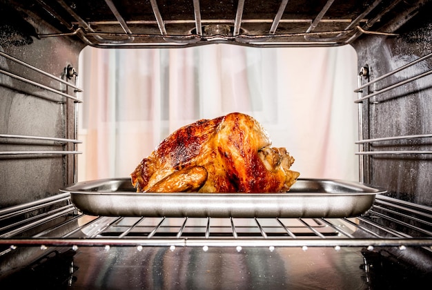 Roast chicken in the oven. Cooking in the oven.