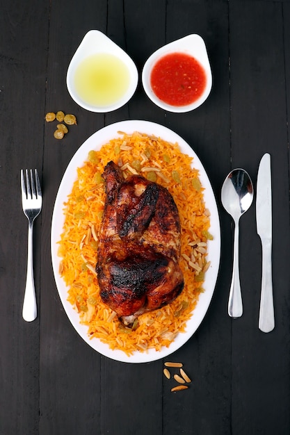 Roast chicken on Wight wooden background