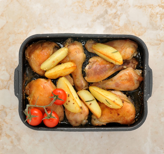 Roast chicken with potatoes