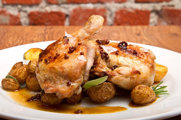 Roast chicken with potatoes