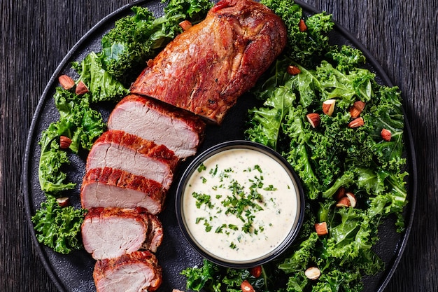 Roast Pork Tenderloin with kale salad and sauce