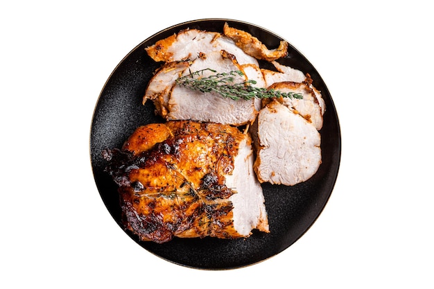 roast rolled pork ham meat on plate with thyme isolated on white background