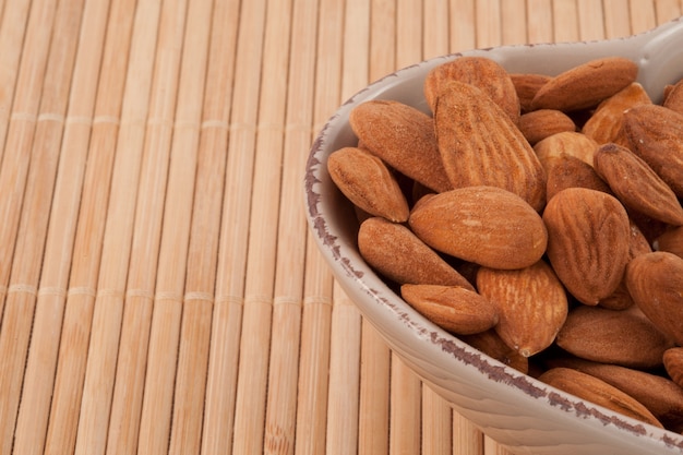 Roasted almonds in bowl