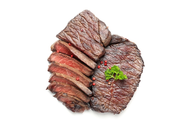 Roasted beef steaks isolated on white background