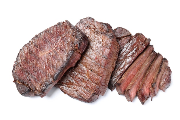 Roasted beef steaks isolated on white background