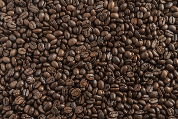 Photo roasted brown coffe beans background