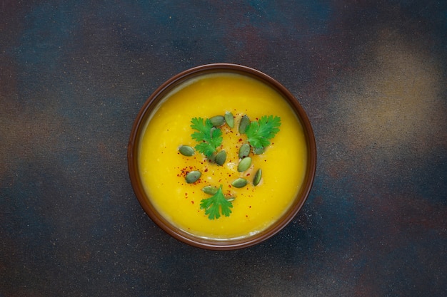 Roasted butternut squash cream soup with pumpkin seeds