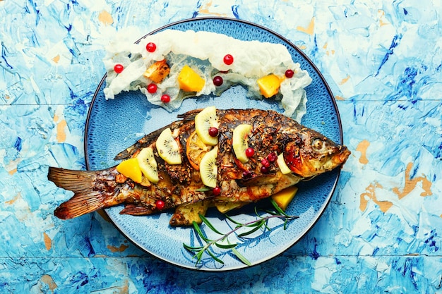 Roasted carp with fruits