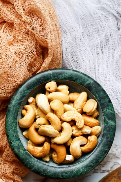 Roasted cashew nuts close-up in a bowl