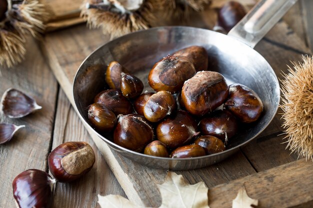 Roasted chesnuts in copper pan