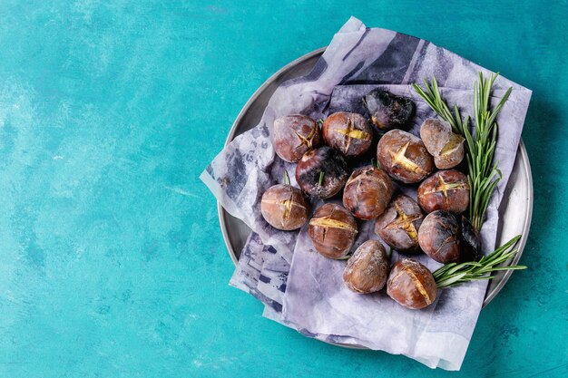 Roasted chestnuts in the ashes