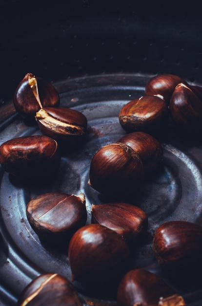 Roasted chestnuts in a pan