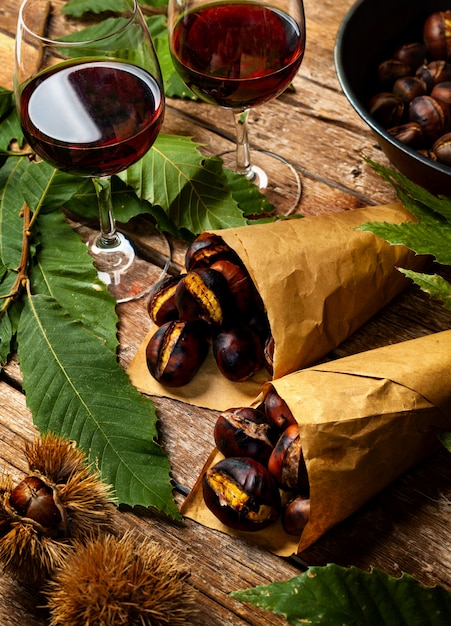 Roasted chestnuts in paper cones.