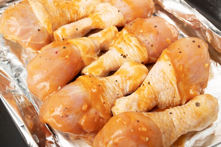Photo オーブンでローストしたスパイスでローストチキンの足