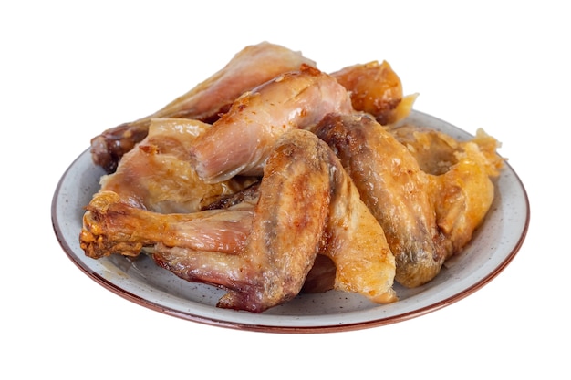 Roasted chicken on the plate isolated on white. Food.