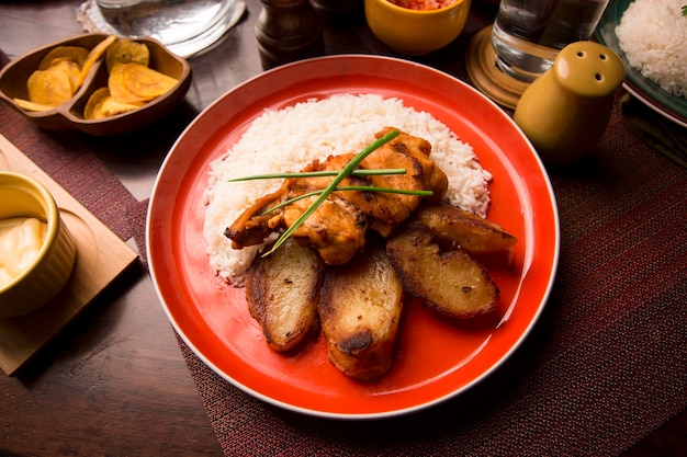 Roasted chicken potatoes rice peruvian traditional comfort food serving