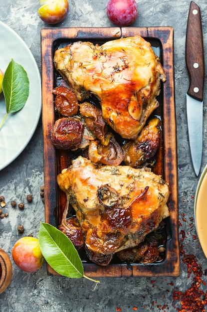 Roasted chicken stuffed with plum