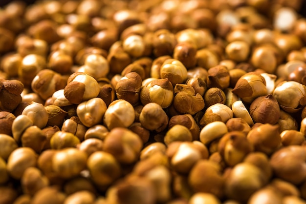 Roasted Chickpea or chana known as futana or Phutana in Hindi served in a bowl or over gunny bag. Selective focus