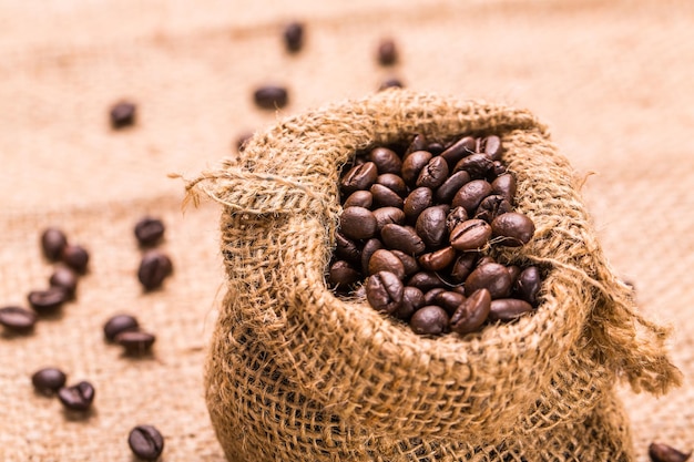 roasted coffee bean in sackcloth close up