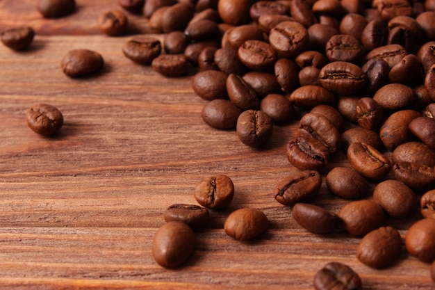 Roasted coffee beans close up aromatic coffee beans