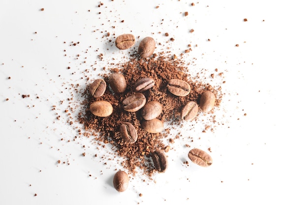 Roasted coffee beans different sort ground and whole isolated close up on white background